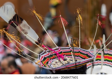 Selective focus Abstract image of a Traditional Naga head gear made of Straws with a Hornbill Bird feather
