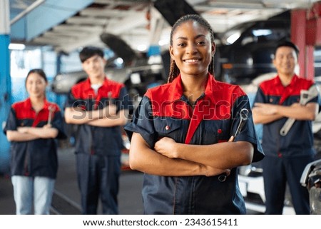 Similar – Image, Stock Photo Mechanic woman standing on motorcycle factory
