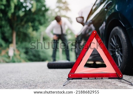 Selective focus of Asian businessman broken car engine breakdown his stressed problem, Accident emergency on the mountain road outdoor late for work concept.