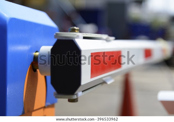 Selective\
focus of auto gate barrier on the car\
parking