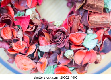 Selective focus and blurred background with copy space of dried petal flower decoration in glass jar shows beautifulness of colorful flora which is luxurious background in vintage and romance style.