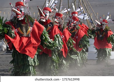 Selective Focus With Blurry Movement Photo Of Traditional Hudoq Dance Of The Dayak People, East Borneo, Indonesia. 