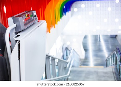 Selective focus to button switch panel of electric stairs for transporting disabled people in subway stations in Bangkok Thailand.