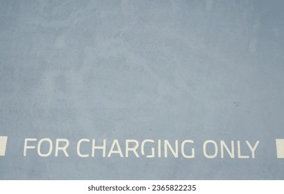Selective focus of for charging only word with copyspace at car charging station. - Shutterstock ID 2365822235