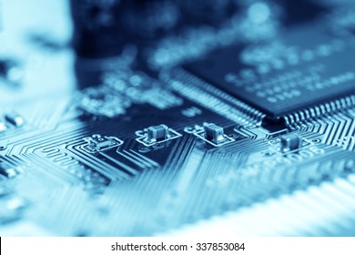 selective focus of close up the computer electronic circuit board , blue color tone