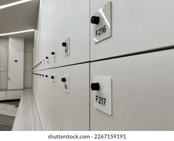 Selective focus close up minimal white locker in the gym for personal belongings - Shutterstock ID 2267159191
