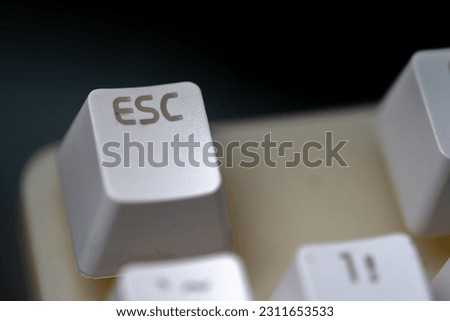 selective focus and close-up photos, the ESC key on a computer keyboard