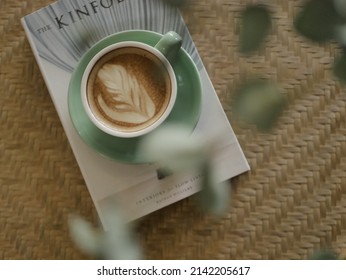 Selective Focus Of Coffee Latte In Coffee Shop Ambience With Blurry Background