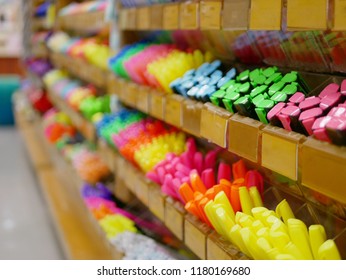 Selective Focus Of Color Pens On Shelves In A Stationary Shop 