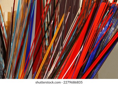 selective focus: Colorful Glass rods waiting to be melted in Eskişehir Glass workshop - Powered by Shutterstock
