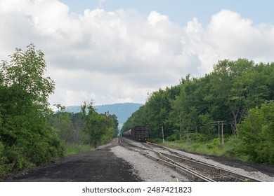 Selective focus copy space train tracks and fuel tanker train industrial background image