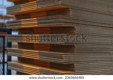 Selective focus of Corrugated brown cardboard for making cardboard boxes or packing.