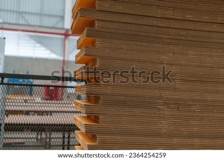 Selective focus of Corrugated brown cardboard for making cardboard boxes or packing.
