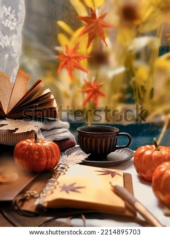 Selective focus of a cup of warm tea next to the window background in the autumn atmosphere
