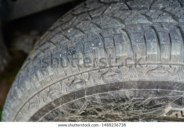 selective focus dirty of truck tires  with\
mud.tires background.