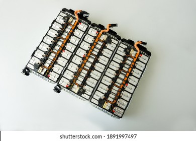 Selective focus of Electric car lithium battery pack and wiring connections internal between cells on background.	