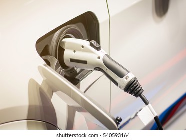 Selective focus electric vehicle charging station - Shutterstock ID 540593164