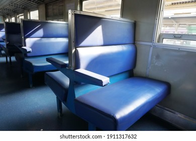 Selective Focus Empty Blue Seats Of 3rd Class Train Of Thailand. Windows Background. Concept Of Seat Texture, Vintage Train, Public Transportation, Economy Class, Leather Seat Texture.