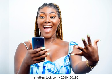 Selective Focus Of Excited African Lady, With Smart Phone