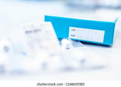 Selective focus at expiration date, lot number print on medical package from manufacturing, information awareness. Healthcare concept.