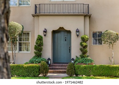 Selective focus featuring entry door of classic style home.