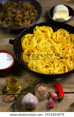 Similar – Foto Bild Italienische Fettuccine Pasta und Kochzutaten