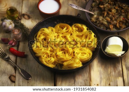 Similar – Foto Bild Italienische Fettuccine Pasta und Kochzutaten