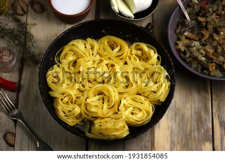 Similar – Foto Bild Italienische Fettuccine Pasta und Kochzutaten