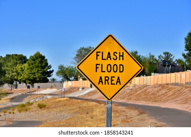 Selective Focus Flash Flood Warning Sign In A Wash Area.