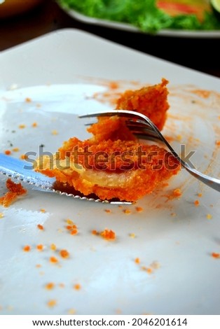 selective focus of flour fried fish leftovers