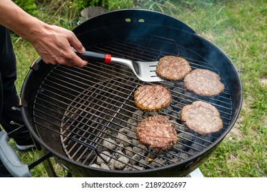 Selective Focus Of Fresh Delicious Burger Cutlets Grilling On Bbq Grill