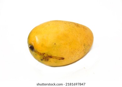 Selective Focus Of Fresh Mango Fruit Isolated On A White Background, A Mango Is An Edible Stone Fruit Produced By The Tropical Tree Mangifera Indica That Varies In Size, Shape, Sweetness And Color