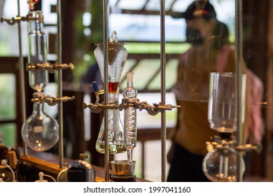 selective focus glass ampoules distillation experiment in the lab of coffee shop drink For the best coffee and beverages in Thailand