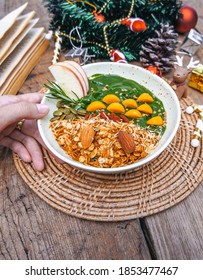 Selective Focus Green Smoothie Bowl And Fresh Fruit In Bowl On Wooden Table Christmas Background