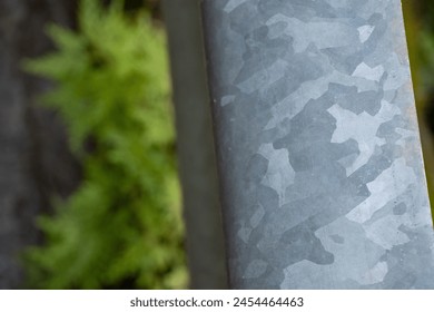 Selective focus Guard Rail steel guardrail in front of the roadside Beautiful metallic camouflage pattern that looks strong and fierce. Prevent the car from going off the road