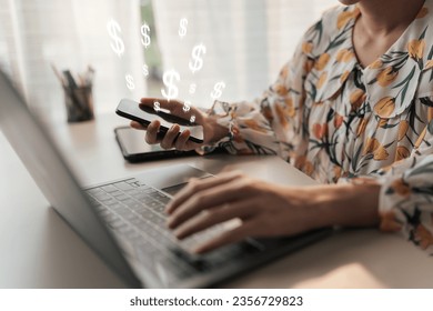 Selective focus hand using smartphone trading. Female hand using mobile phone with online transaction application, earning money income. Concept ecommerce and internet investment.