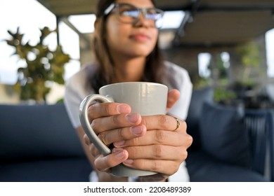 Selective Focus Of Hands Holding A Cup Of Coffee. Free Time Concept