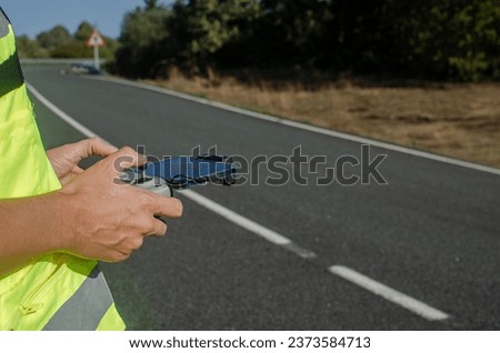 Selective focus, hands of a man operating a drone