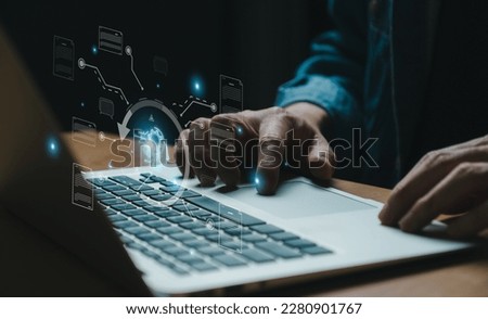Selective focus at human hand while type or input a command to navigate chatbot or AI to get answer or information from big database. Artificial intelligence that can provide SEO or business info.