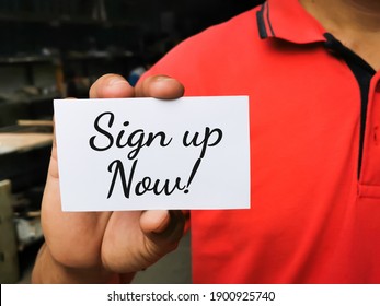 Selective focus image with noise effect hand holding white card with text SIGN UP NOW.Business concept. - Shutterstock ID 1900925740