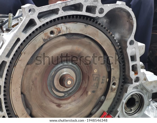 Selective focus image with noise effect automatic\
gear box for sedan\
car.