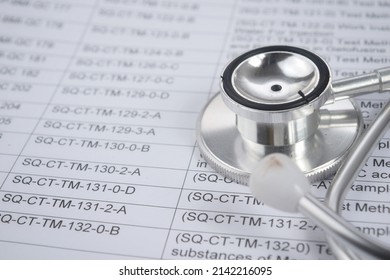 Selective Focus Image Of Stethoscope With Documents Serial Code. Selective Focus Image 