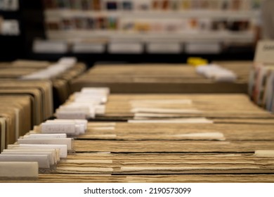 Selective Focus At Label, Tag Name Of Old Folders Of Postcard Archives In Postcard Store. 