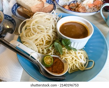 Selective Focus Of Laksa Johor. Malaysia Traditional Food. This Photo Contains Noise And Grain Due Low Light