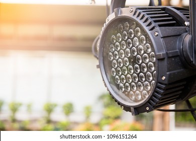 Selective Focus Of LED City Color Light With  Orange Light Beside The Wall.Close Up Of The Giant LED Light Or Par Light On The Wall.