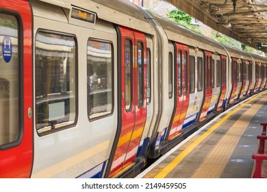 Selective focus, A London tube train waiting at an empty platform