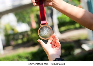 Selective Of Focus A Medal For Running Event In Virtual Run.