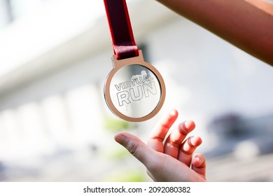 Selective Of Focus A Medal For Running Event In Virtual Run.