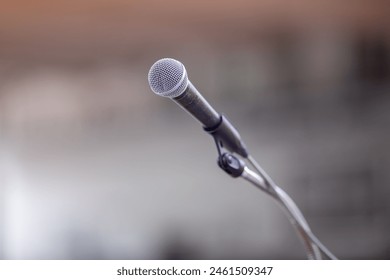 Selective focus to microphone with blurry background.