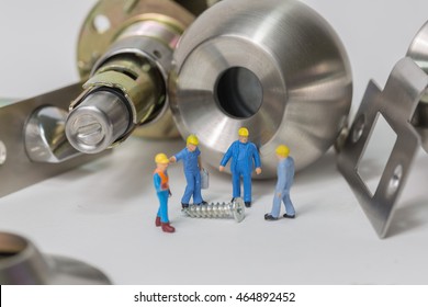 Selective Focus Of Miniature Engineer And Worker Meeting And Discuss Of Manufacturing Stainless Steel Round Ball Door Knob Component As Locksmith, Business And Industrial Concept.